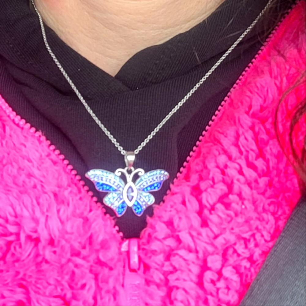 Butterfly Purple and Blue Swarvorski Stone necklace pendant on a silver chain.